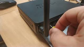 How to Hard Reset router Cisco [upl. by Torrin]