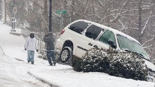 Atlanta commuters stranded in cars after snowfall [upl. by Esina]