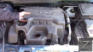 How to remove the engine cover from a Chevy Equinox [upl. by Arrehs275]